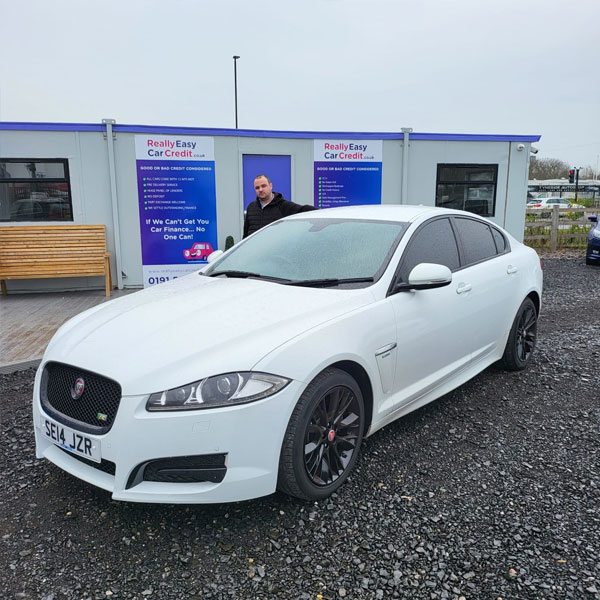 Happy customer by car